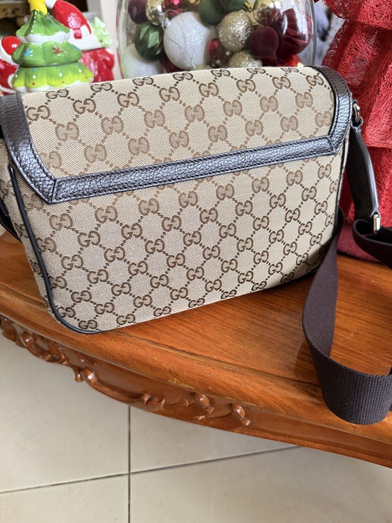 Gucci Canvas Crossbody Bag (Category: Luxury Bags & Wallets) located in San Fernando. Submitted by olliebash (Listing ID 1469109689, Image 2). Description: - Bough brand new in Japan Gucci Outlet store - With dustbag - Used few times then got stored in bag closet - Canvas is clean, no issues - Leather in magnet closure has slight discoloration - Can be unisex.