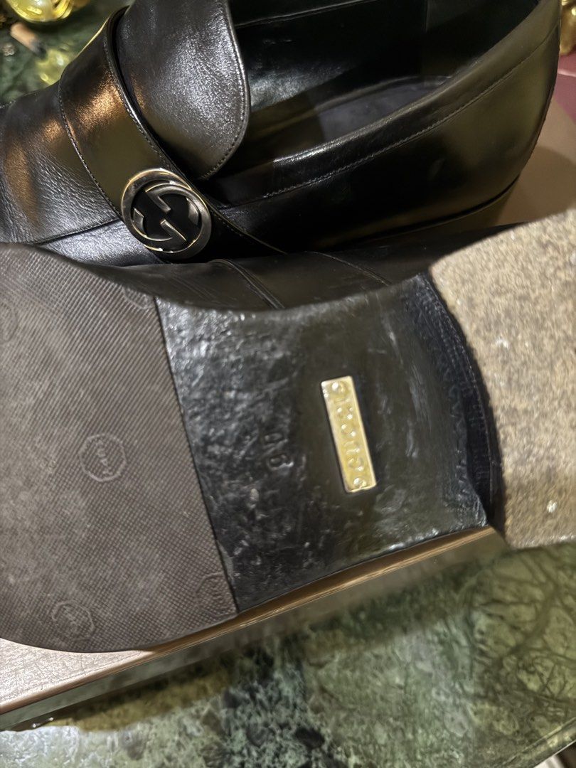 Gucci Lifford Interlocking G Leather Loafers (Category: Dress Shoes) located in Manila. Submitted by rojotesoro (Listing ID 1469119222, Image 2). Description: - Brand: Gucci - Style: Black leather slip-on loafers with square toe and stacked heel - Hardware: Silver-tone Interlocking G strap across the front - Condition: Well-maintained upper leather with natural creases from wear; sturdy rubber sole - Inclusions: Original branded box, dust wrapper