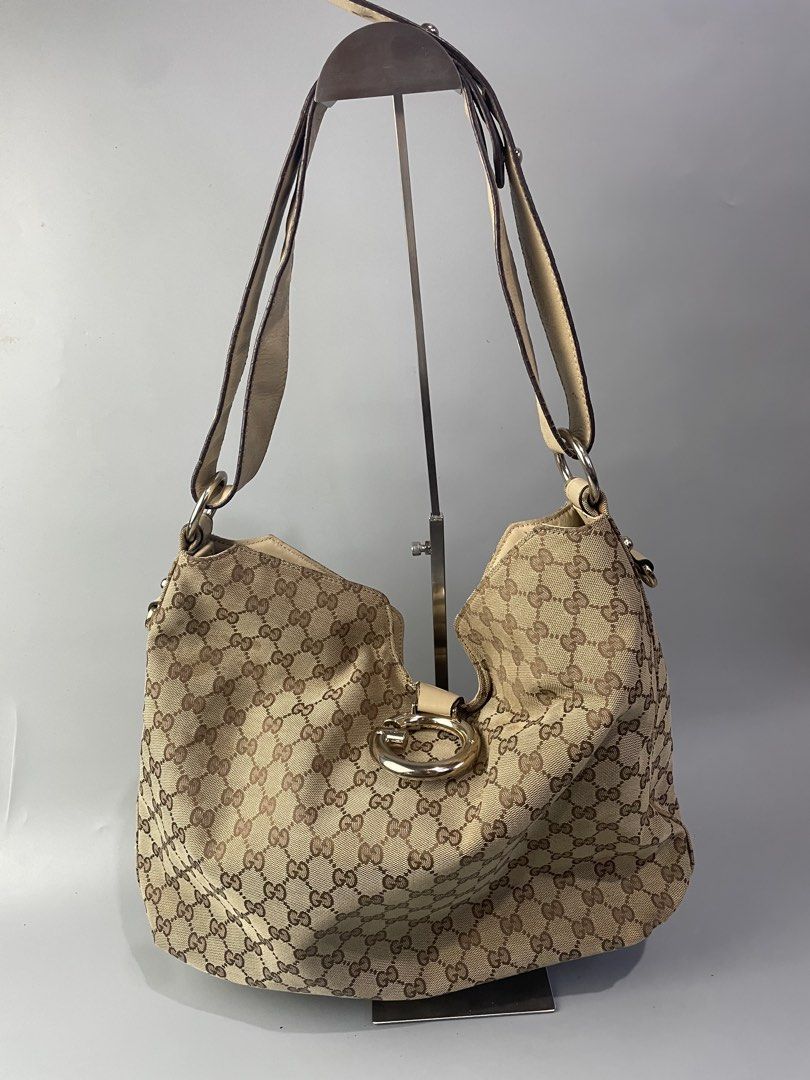 Gucci Monogram Canvas Hobo Bag (Category: Luxury Bags & Wallets) located in Veruela. Submitted by blinkban_thrift (Listing ID 1469000831, Image 1). Description: Gucci Excellent condition Need wash only Location: Mindanao.