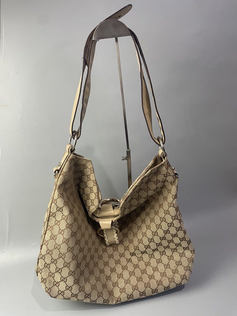 Gucci Monogram Canvas Hobo Bag (Category: Luxury Bags & Wallets) located in Veruela. Submitted by blinkban_thrift (Listing ID 1469000831, Image 2). Description: Gucci Excellent condition Need wash only Location: Mindanao.