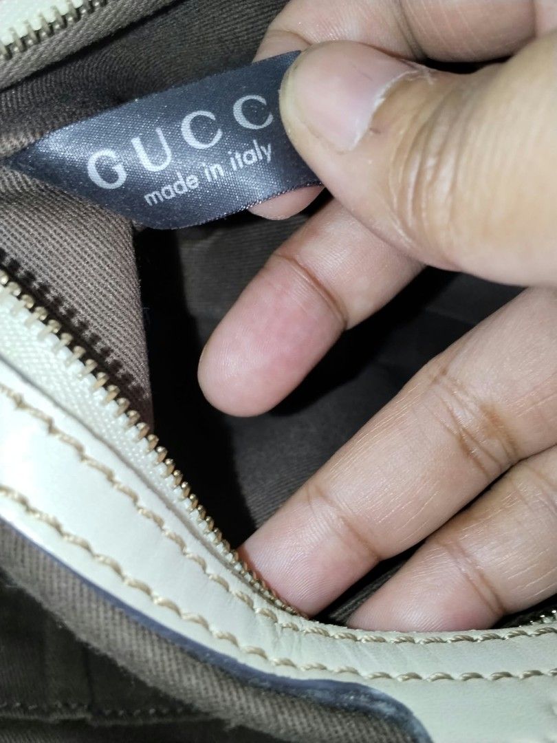 Gucci tote (Category: Tote Bags) located in Manila. Submitted by bagelyascollection (Listing ID 1468966144, Image 3). Description: Gucci tote signature canvas dog design in front.