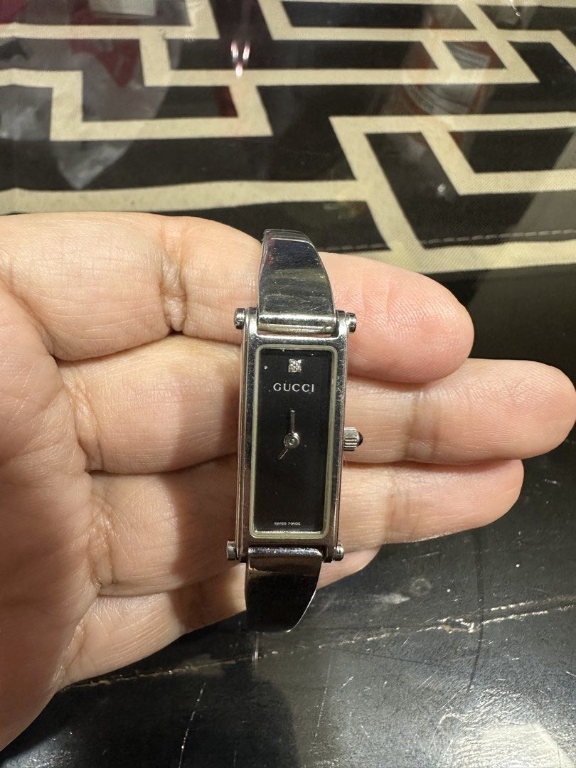 Gucci watch (Category: Luxury Watches) located in Tarlac. Submitted by rizasdeclutteringonline2 (Listing ID 1468988163, Image 1). Description: Gucci watch -with diamond -no cracks -used but not abused -no batter(papalagyan ko once na may bumili just to make sure na hindi sira ang watch) Not free SF po. -I bought this for ₱15,000 and selling it ₱12,000 and still negotiable wag lang baratin madali po ako kausap. God Bless everyone po .