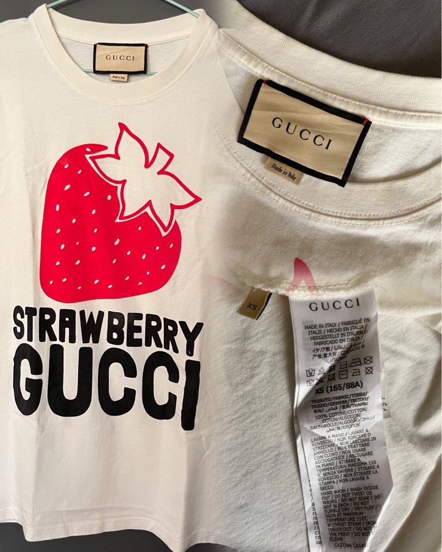 Gucci's white T-shirt (Category: Luxury Apparel) located in Cebu City. Submitted by luxewearhub (Listing ID 1468978974, Image 1). Description: Product Details Gucci’s white T-shirt is shaped in Italy from cotton-jersey with a playful strawberry logo print, capturing the label’s free-spirited ethos. - 100% cotton GUCCI Hottest heritage brand on the fashion radar right now, Gucci is redefining modern luxury under new creative director Alessandro Mi
