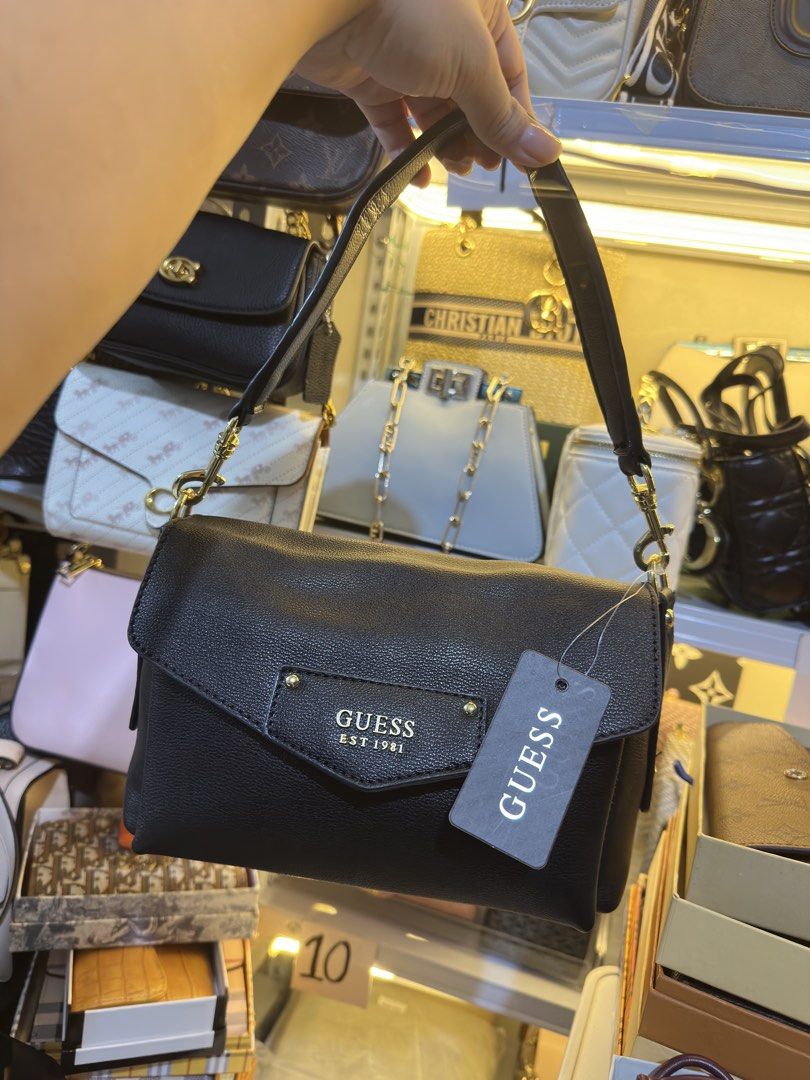 Guess 2way Bag (Category: Shoulder Bags) located in Binmaley. Submitted by amayscollections (Listing ID 1469096783, Image 1). Description: On sale Orig MP0 Guess 2way Bag sobrang ganda sale na kasi jinoyjoy huhu for only: ₱799+sf payment first ₱869+sf cash on delivery 📍Pangasinan We Ship Nationwide🚚.
