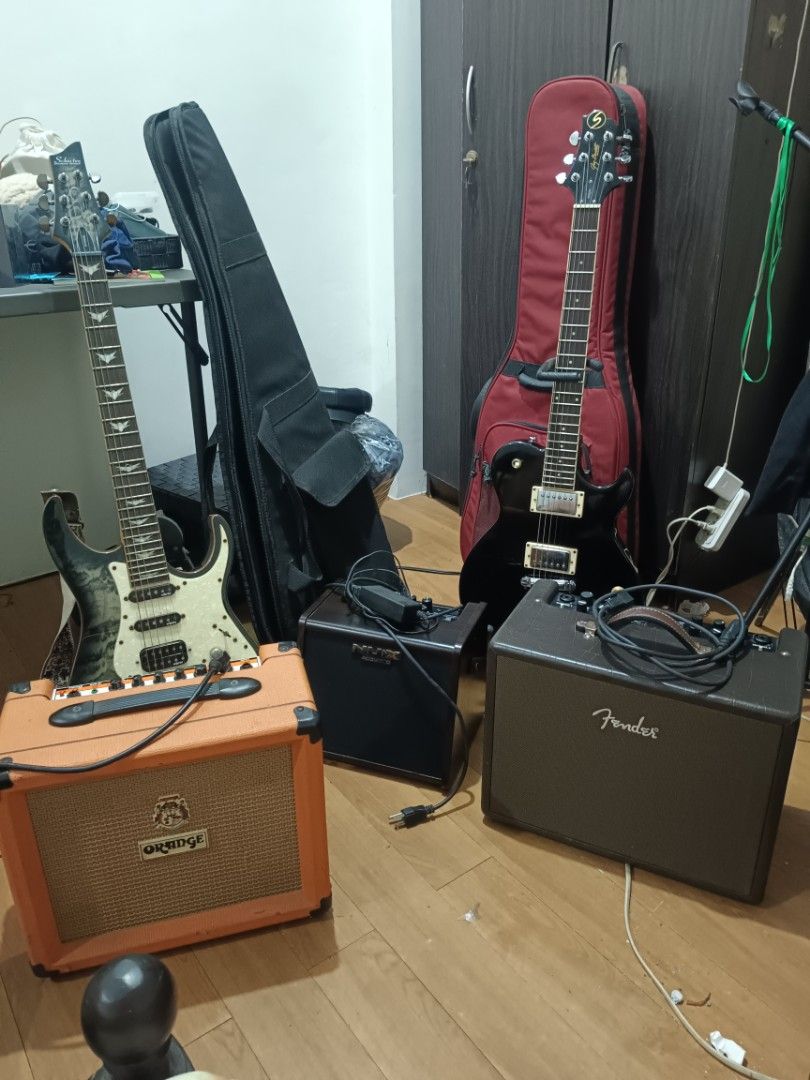 Guitars, amplifiers, and gig bags bundle (Category: Musical Instruments) located in Quezon City. Submitted by giox315 (Listing ID 1469151449, Image 1). Description: - All-in-one electric guitar practice bundle - Includes multiple electric guitars, soft cases, and cables - Features popular practice amps: Orange, Fender, and NUX Acoustic - Fully tested: everything powers up and works normally - Normal cosmetic wear from room practice (I am a music 
