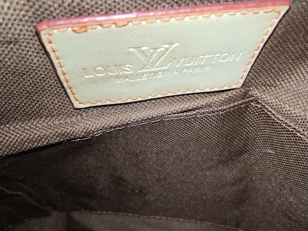 Handbag Lv (Category: Tote Bags) located in Cavite. Submitted by bagssection04 (Listing ID 1468947576, Image 3). Description: Louis Vuitton handbag dark brown color not sure or should I say vintage med to large size.