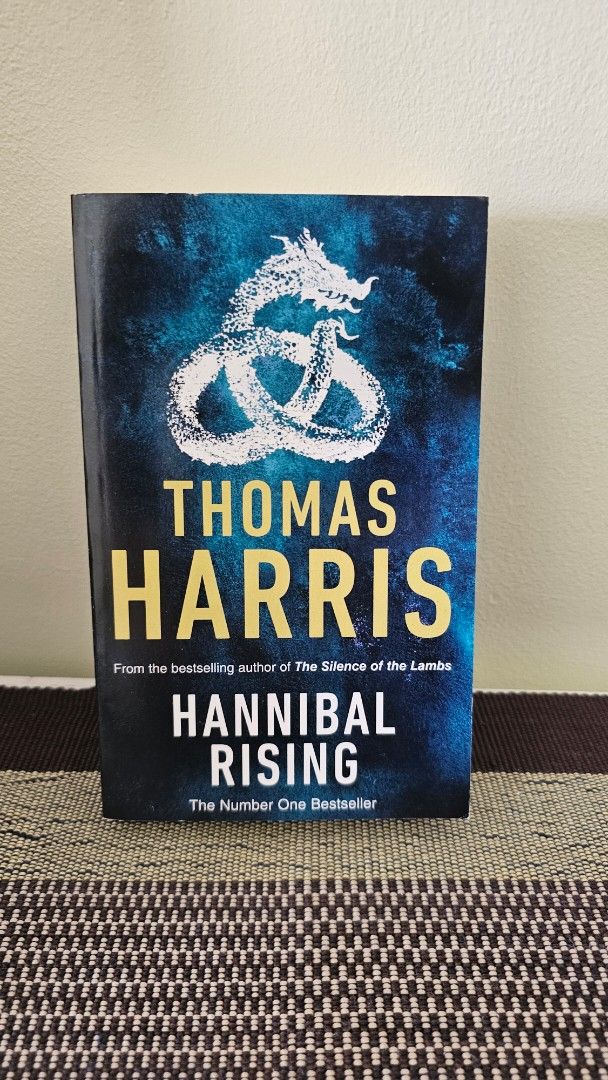 Hannibal Rising by Thomas Harris Paperback Novel (Category: Storybooks) located in Manila. Submitted by erikuhrox007 (Listing ID 1468981764, Image 3). Description: - Title: Hannibal Rising by Thomas Harris - Publisher: Arrow Books - Format: Standard paperback - Condition: Brand new - Details: Explores the chilling origin story of Hannibal Lecter - Perfect for: Thriller enthusiasts and completing your Thomas Harris book collection.