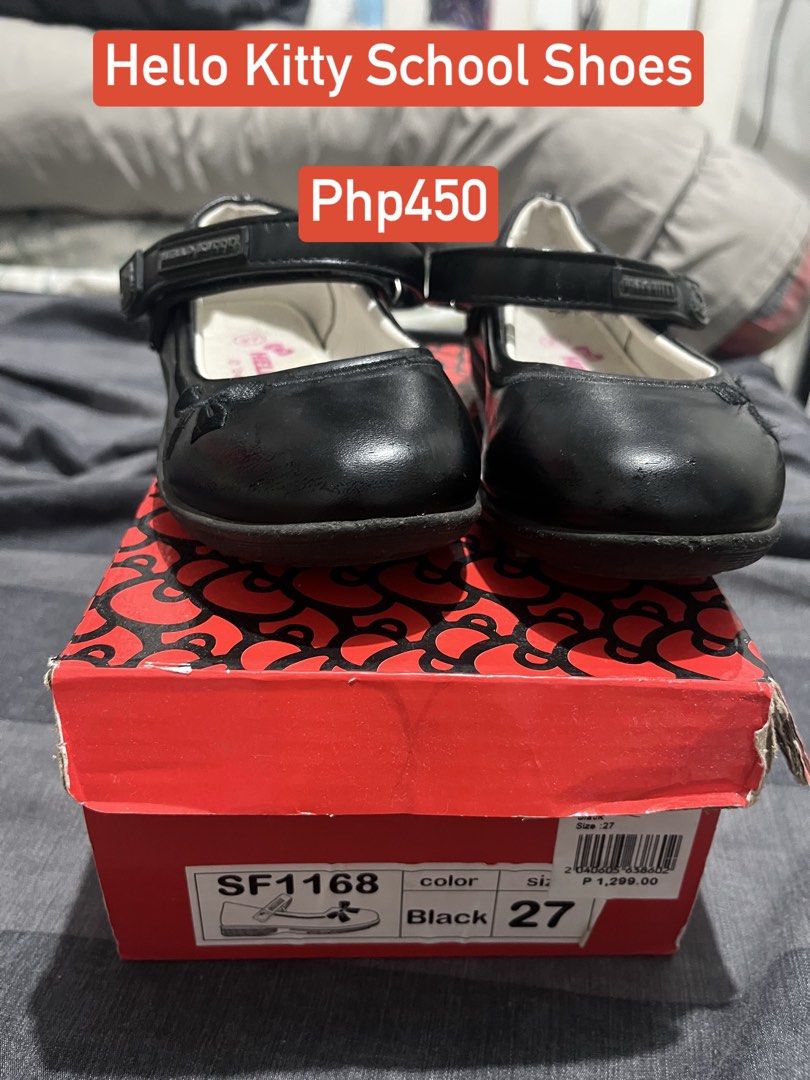 Hello Kitty School Shoes Black Size 27 (Category: Babies & Kids Fashion) located in Las Pinas. Submitted by freeowl_eb0f7b (Listing ID 1468942836, Image 1). Description: - Brand: Hello Kitty - Model: SF1168 - Size: 27 - Color: Black - Features: Adjustable top strap with a subtle Kitty side detail - Condition: Great for school uniforms or formal events - Packaging: Includes original red box - Original Retail Price: P1,299.