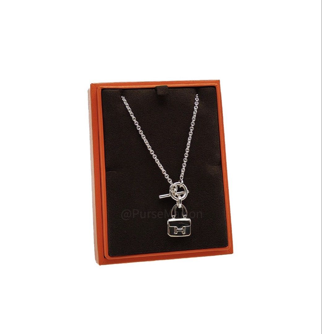 Hermes Amulette Constance Pendant (Category: Luxury Accessories) located in Taguig. Submitted by closetcompany (Listing ID 1468972121, Image 2). Description: Hermes Amulette Constance Pendant Price: Php 82,600.00 (Cash & bank transfer discounts may be available. Please contact our Maison Advisors for details.) Condition: Like New (9.8/10) with minor hairline scratches. Inclusions: Box, Ribbon and Copy of Receipt. .