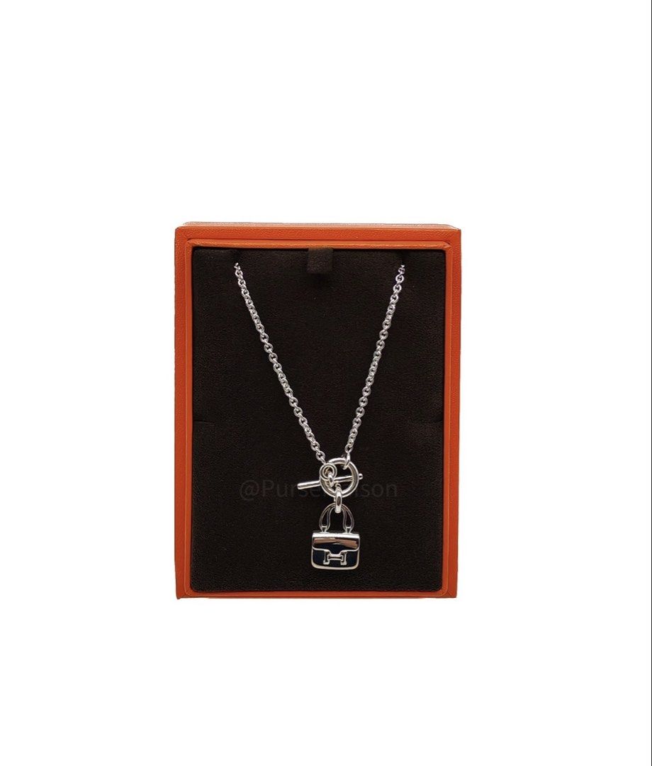 Hermes Amulette Constance Pendant (Category: Luxury Accessories) located in Taguig. Submitted by closetcompany (Listing ID 1468972121, Image 1). Description: Hermes Amulette Constance Pendant Price: Php 82,600.00 (Cash & bank transfer discounts may be available. Please contact our Maison Advisors for details.) Condition: Like New (9.8/10) with minor hairline scratches. Inclusions: Box, Ribbon and Copy of Receipt. .