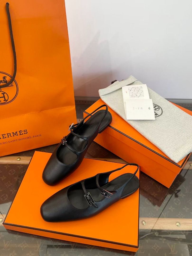 Hermes Black Leather Slingback Flats (Category: Flats & Sandals) located in Manila. Submitted by finniehkay13581 (Listing ID 1469006708, Image 3). Description: - Brand: Hermes - Style: Black leather slingback flats with rounded toe - Details: Double strap design with sleek silver hardware - Condition: Pristine, brand new look - Inclusions: Complete set with original orange box, dust bag, gift bag, and care booklet - Bonus: Includes a stylish pair