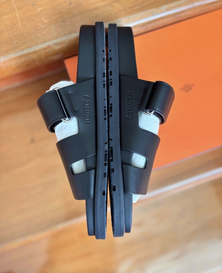 Hermes Chypre Sandals Black (Category: Flats & Sandals) located in Muntinlupa City. Submitted by ironman0907 (Listing ID 1469057395, Image 2). Description: Hermès Chypre Sandals – Brand New, Unused A luxurious pair of Hermès Chypre sandals featuring a bold, modern design and exceptional comfort. A highly sought-after style that can be difficult to find in boutiques due to limited availability. Product Details * Brand: Hermès * Model: Chypre Sanda