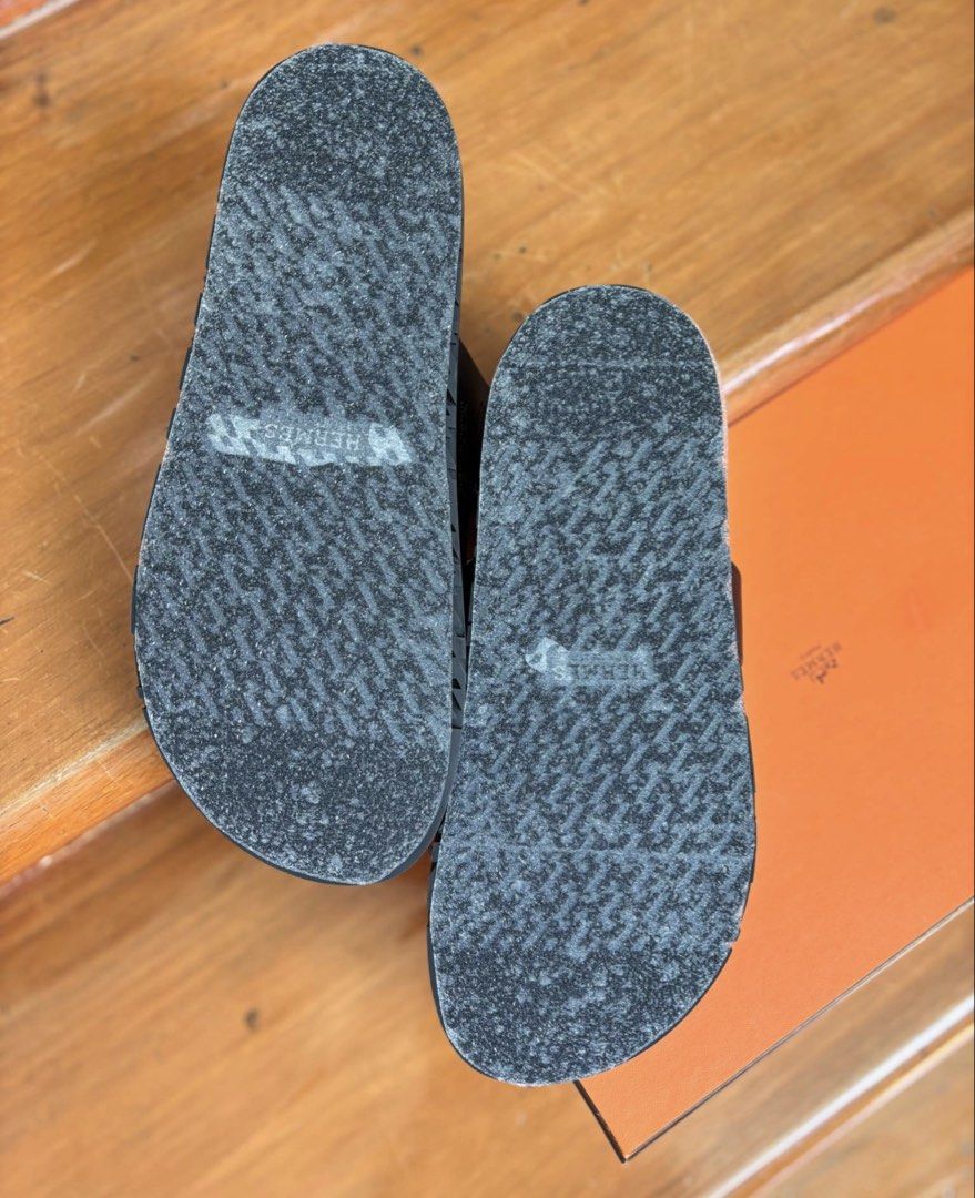 Hermes Chypre Sandals Black (Category: Flats & Sandals) located in Muntinlupa City. Submitted by ironman0907 (Listing ID 1469057395, Image 3). Description: Hermès Chypre Sandals – Brand New, Unused A luxurious pair of Hermès Chypre sandals featuring a bold, modern design and exceptional comfort. A highly sought-after style that can be difficult to find in boutiques due to limited availability. Product Details * Brand: Hermès * Model: Chypre Sanda