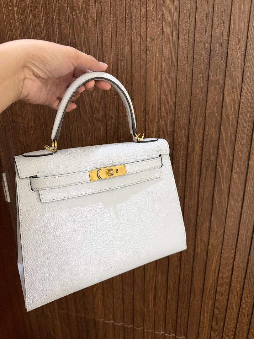 Hermes Kelly 28 Epsom (Category: Luxury Bags & Wallets) located in Cavite. Submitted by hermeslover11 (Listing ID 1469062947, Image 1). Description: - Coded - With dustbag and strap - Color: Blue Brume - With light discoloration but not too visible and well hidden. - From Korea.