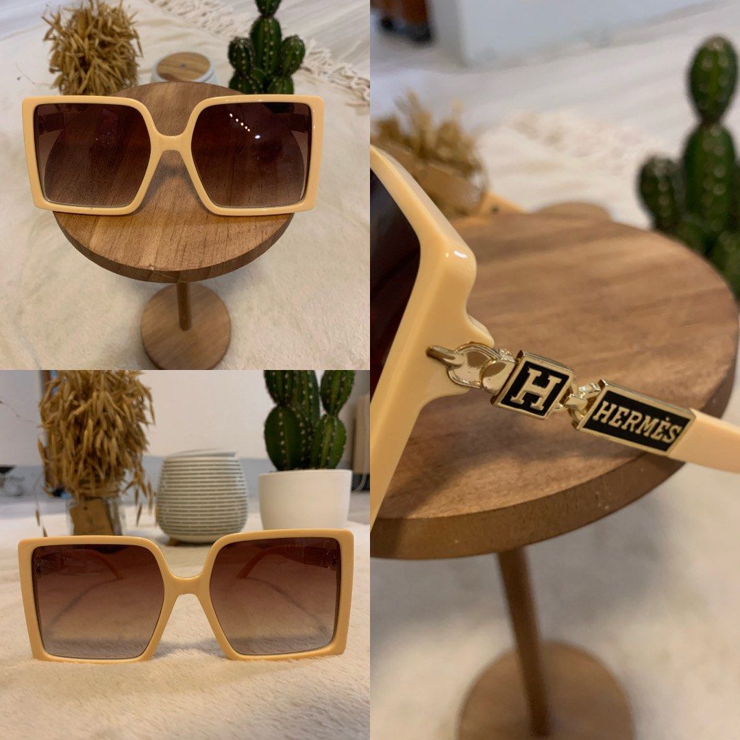 Hermes Square Oversized Sunglasses Cream Gold (Category: Sunglasses & Eyewear) located in Manila. Submitted by paulbrayan37775 (Listing ID 1469102444, Image 1). Description: - Brand: Hermès - Style: Oversized square sunglasses - Frame: Thick cream-colored frames - Lenses: Gradient brown - Hardware: Gold-tone with iconic H logo and Hermès lettering - Condition: Clean overall, great statement accessory.