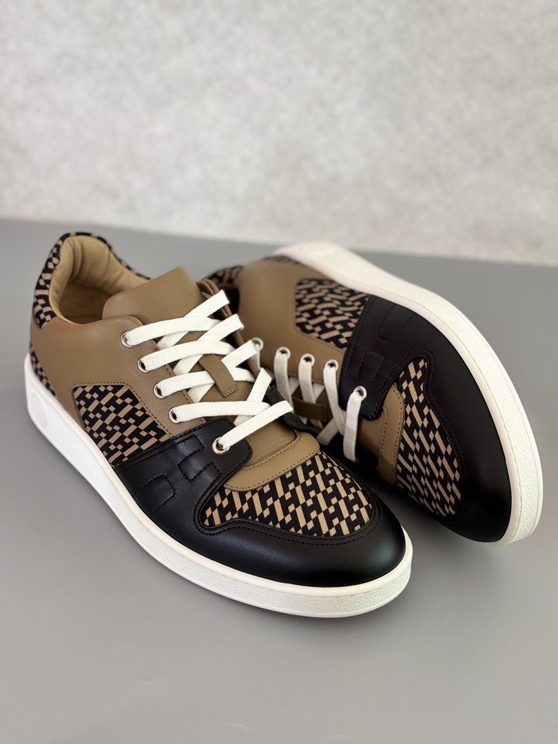Hermès Free Sneakers (Category: Sneakers) located in Muntinlupa City. Submitted by ironman0907 (Listing ID 1469065200, Image 1). Description: Hermès Free Sneakers Selling a brand new, 100% authentic Hermès Free Sneakers in iconic beige & black colorway. Product Details: Brand: Hermès Model: Free Sneaker Size: EU 41.5 (US 8.5–9 / 265–270mm equivalent) Condition: Brand New In Box (BNIB) / Unused Color: Beige & Black Material: Premium Calfskin Leath