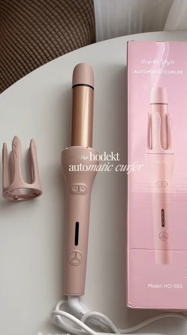 Hodekt Automatic Curler Model HCI-003 (Category: Hair) located in San Jose del Monte. Submitted by vakadela54883 (Listing ID 1469124987, Image 1). Description: - Brand/Model: Hodekt Automatic Hair Curler (HCI-003) - Color: Cute and stylish pink - Condition/Inclusions: Complete with styling attachment piece and original box - Power: Plugs directly into standard wall outlets - Features: User-friendly design for quick and effortless styling - Perfec