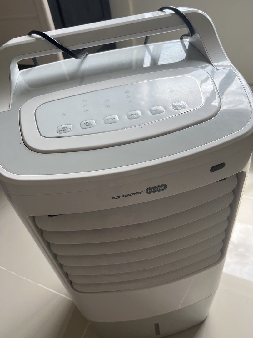 Home Air Cooler Fan (Category: Air Conditioning and Heating) located in Mandaluyong City. Submitted by bravedeer.020ad7 (Listing ID 1468953713, Image 3). Description: - Brand/Model: Xtreme Home Air Cooler - Color: White and grey - Features: Top control panel with EVA cooler, timer, style, speed, oscillation, and power buttons, plus front louvers for optimal airflow - Condition: Used with normal signs of handling - Performance: Works perfectly and