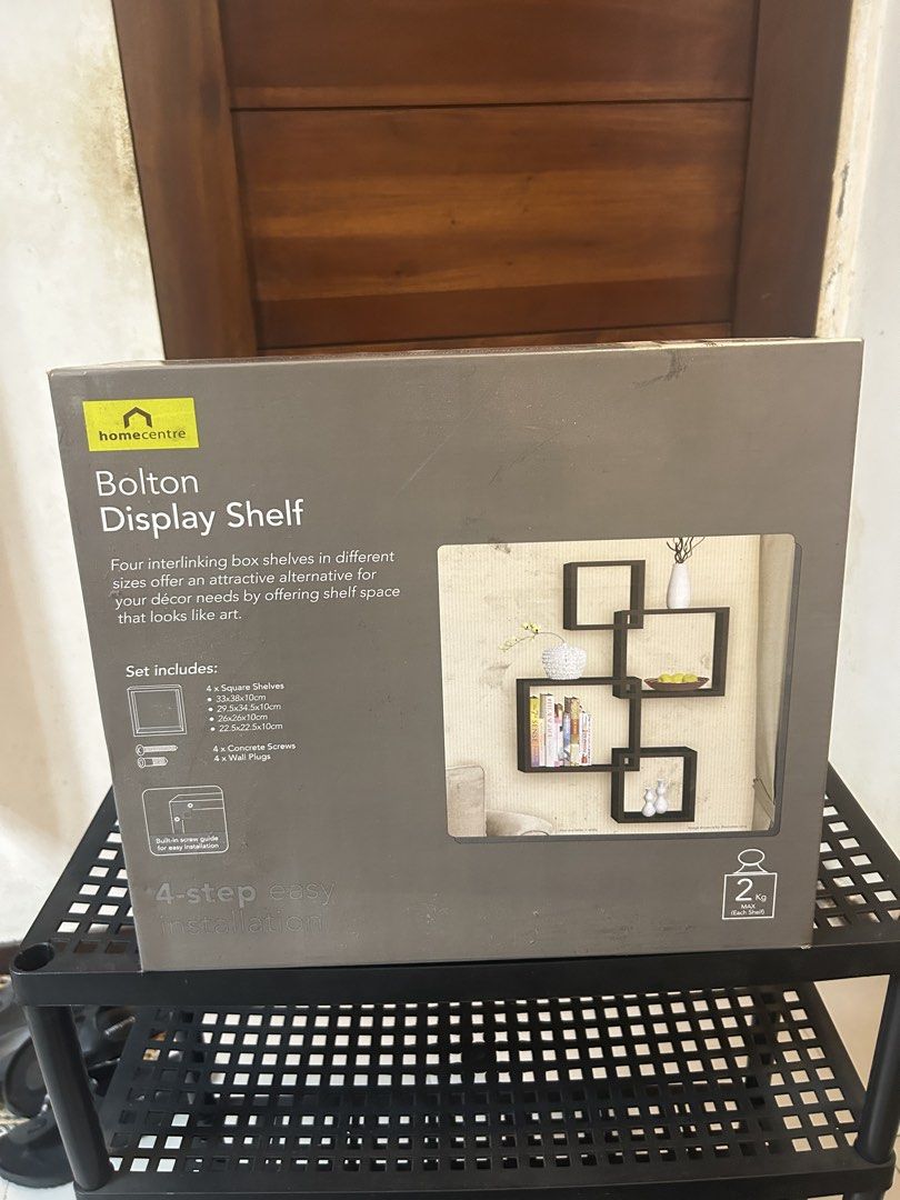 Homecentre Bolton Display Shelf Box Set (Category: Shelves, Cabinets & Racks) located in Paranaque City. Submitted by mikhaillll (Listing ID 1469126465, Image 2). Description: - Set of 4 versatile interlinking box shelves - Customizable wall layout for any room - 4 different sizes: 33x38cm, 29.5x34.5cm, 26x26cm, and 22.5x22.5cm with a 10cm depth - Max weight capacity of 2kg per shelf - Includes concrete screws, wall plugs, and easy installation g