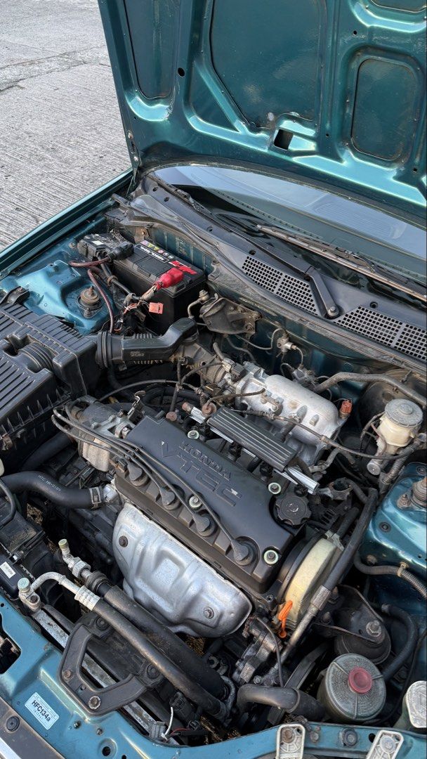 Honda Civic 1.6 VTI (A) (Category: Used Cars) located in Manila. Submitted by euviepollack (Listing ID 1469099381, Image 3). Description: For sale! ₱158,000 RUSH NEGOTIABLE‼️ FRESH unmolested Honda Civic VTI bigote 1998 model Automatic transmission. - Binyahe ng 9 HOURS STRAIGHT! zero problem. zero issues engine. - Kahit ilong drive muna natin bago niyo bayaran, basta sagot niyo gas unli hataw😅 - Bone stock engine walang kahit anong aftermarket 