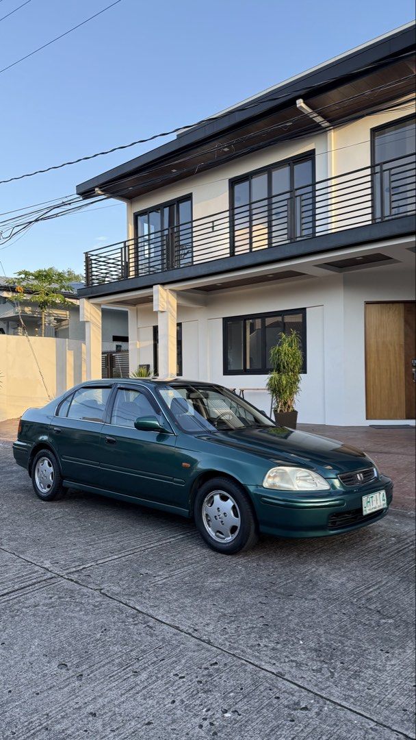Honda Civic 1.6 VTI (A) (Category: Used Cars) located in Manila. Submitted by euviepollack (Listing ID 1469099381, Image 1). Description: For sale! ₱158,000 RUSH NEGOTIABLE‼️ FRESH unmolested Honda Civic VTI bigote 1998 model Automatic transmission. - Binyahe ng 9 HOURS STRAIGHT! zero problem. zero issues engine. - Kahit ilong drive muna natin bago niyo bayaran, basta sagot niyo gas unli hataw😅 - Bone stock engine walang kahit anong aftermarket 