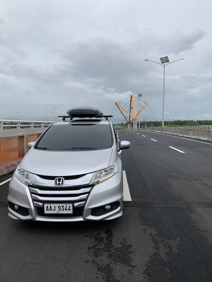 Honda Odyssey 2.4 EXV Premium (A) (Category: Used Cars) located in Quezon City. Submitted by mancave_stuff (Listing ID 1468941359, Image 1). Description: •Honda Odyssey EX V Navi 7-seater Top of the line •Color: Platinum silver •Mileage: 54.000+kms •2nd row Captain seats with footrest •A/V audio Sounds upgrade with high end Morel separates speakers system and JBL subwoofer for quality sound system (P100k) •Includes Thule roof Cross bars • Inno RV