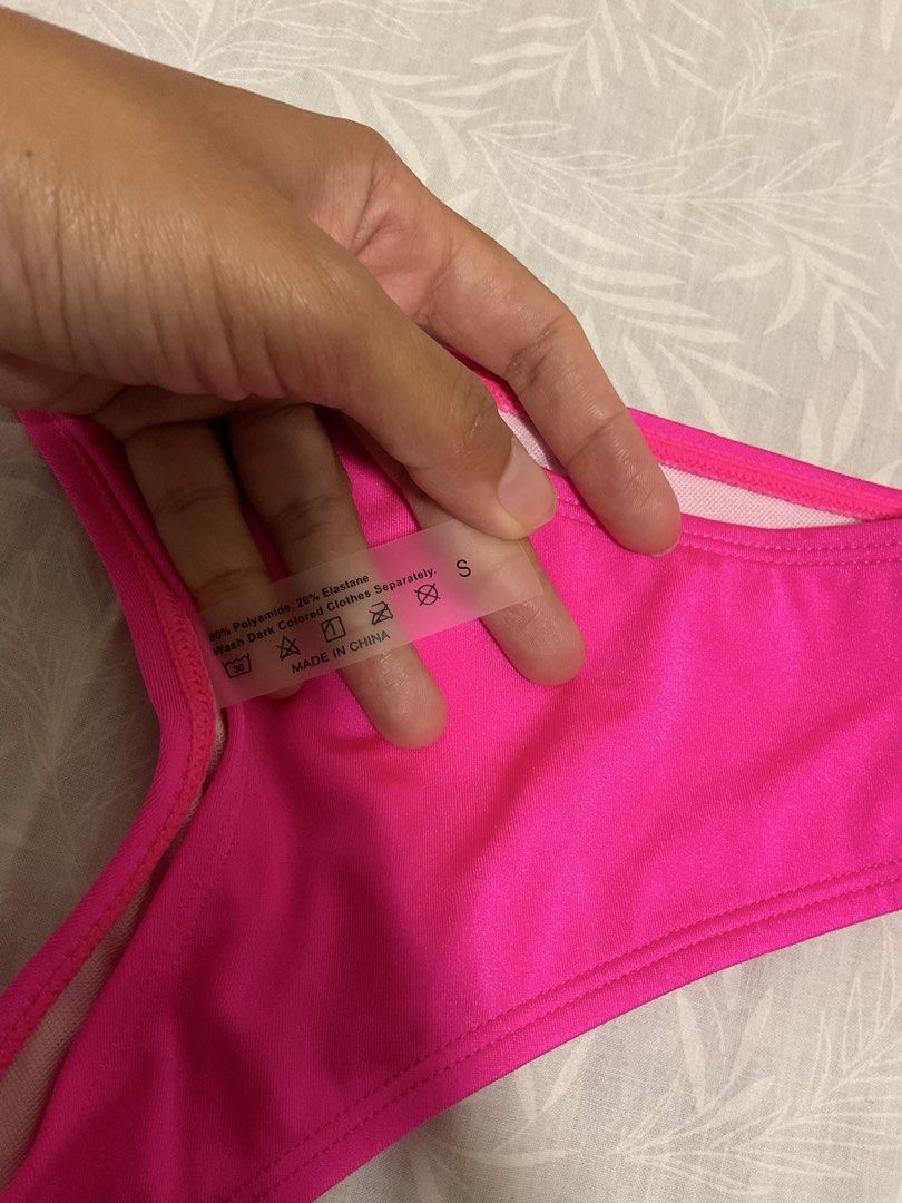 Hot Pink Two-Piece Bikini Set Size S (Category: Bikinis & Swimsuits) located in Taytay. Submitted by prelovedbyblaire (Listing ID 1469102964, Image 2). Description: - Color: Vibrant hot pink - Size: Small (tag attached) - Style: Bandeau top with center tie detail and matching high-cut bottoms - Material: 80% polyamide, 20% elastane - Condition: Brand new, never worn out - Care: Wash dark colors separately.