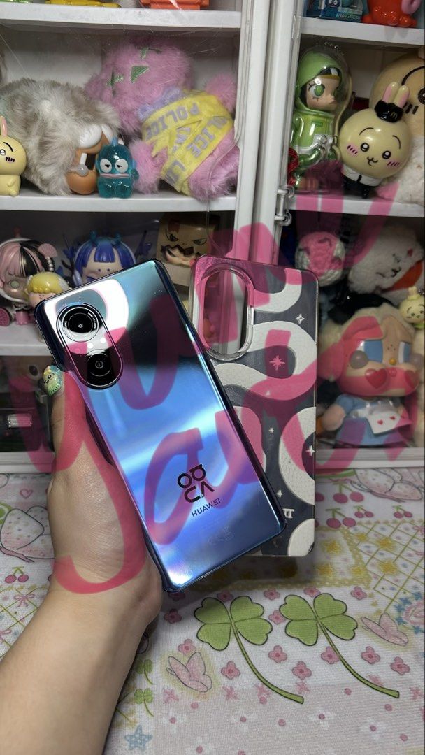 Huawei Nova 9 SE (Category: Huawei) located in Manila. Submitted by yume_artsss (Listing ID 1468984934, Image 1). Description: - Brand/Model: Huawei Nova 9 SE - Storage: 128GB - Design: Stylish, slim profile with a glossy, light-reflecting back finish - Condition: Well-maintained and in great shape, used it for 20 times only - Inclusions: Includes a stylish patterned phone case - I can send more videos for more details and smoothness of the devic