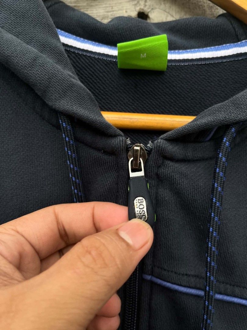 Hugo Boss (Category: Hoodies) located in Manila. Submitted by skippypeanut1331 (Listing ID 1468968513, Image 3). Description: 21.5x26 Medium Very good condition Color rate: 8.9/10 Issue: minimal scratch.
