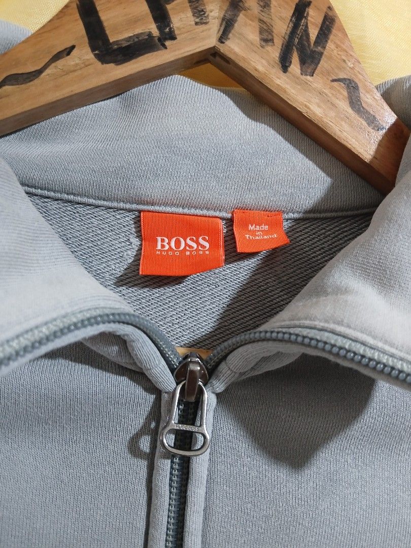 HUGO BOSS Full Zip Jacket Light Blue Size L (Category: Coats, Jackets and Outerwear) located in Taguig. Submitted by thriftnilhan (Listing ID 1468942741, Image 3). Description: - Brand: HUGO BOSS - Size: L - Color: Light Blue - Origin: Made in Thailand - Design: Full zip with ribbed side panels, collar, cuffs, and hem - Pockets: Front zip pockets featuring subtle contrast stitching - Branding: BOSS logo printed on the back near the collar - Care: