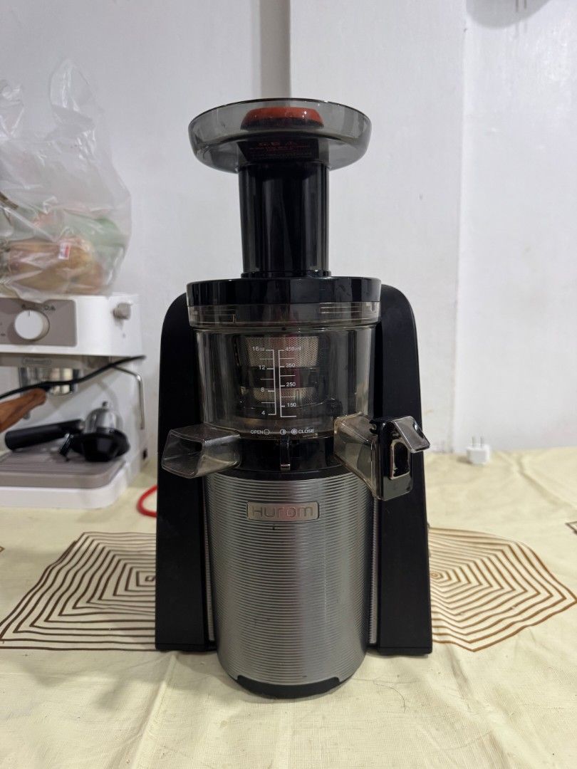 Hurom Premium Vertical Slow Juicer HVS-STF14 (Category: Juicers, Blenders & Grinders) located in Lapu Lapu. Submitted by axl.rose05 (Listing ID 1469057948, Image 1). Description: Premium Hurom slow juicer for making fresh fruit and vegetable juice at home. Compact vertical design with a low-speed squeezing system. Specifications: ✓ Brand: Hurom ✓ Model: HVS-STF14 ✓ Voltage: 220V / 60Hz ✓ Power: 150W ✓ Color: Silver and Black Inclusions: ✓ Motor b