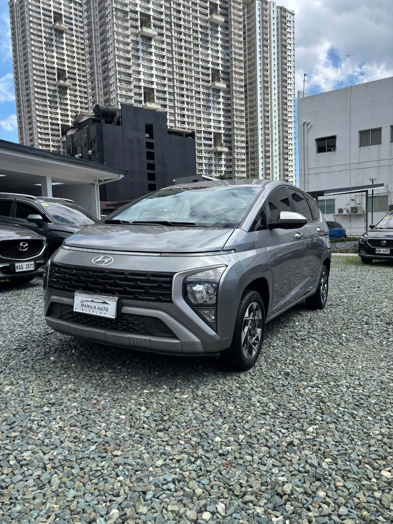 Hyundai Stargazer GLS 1.5L Auto (Category: Used Cars) located in Pasig City. Submitted by pureocean-057512 (Listing ID 1468985354, Image 2). Description: 2025 HYUNDAI STARGAZER GLS GAS AUTOMATIC TRANSMISSION Downpayment: ₱102,527 Silver Automatic Transmission 1.5L Gasoline Engine 8 ending plate 30tkms mileage Push Start & Smart Key 7 Seater Wireless Apple CarPlay & Android Auto Reverse Camera Automatic Climate Control 6 Airbags 16-inch Alloy Whee