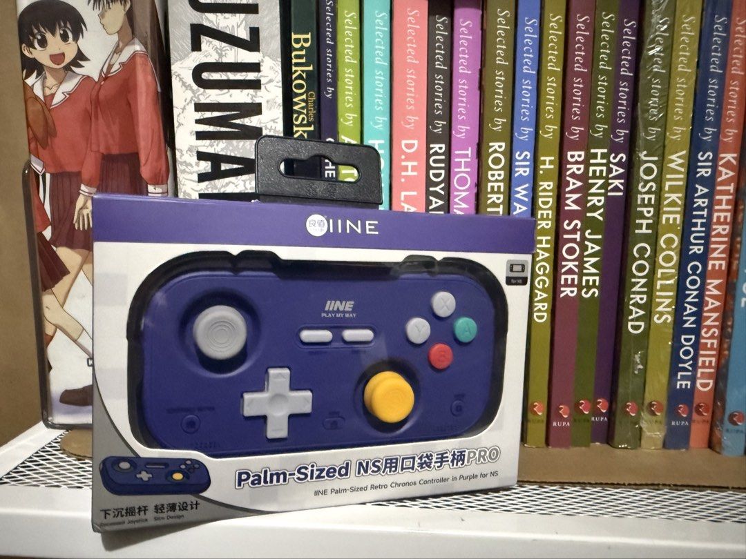 IINE Palm-Sized Retro Chronos Controller Purple for Nintendo Switch (Category: Controllers) located in Quezon City. Submitted by gritxfaith (Listing ID 1469122676, Image 1). Description: Sa switch ko sya nagamit at iphone pero pwede to sa lahat! Mas mabilis ang response kesa sa 8bitdo ultimate 2c both wired at bluetooth. Ginamit lang pang retro games for a very few times. - Item: IINE Palm-Sized Retro Chronos Controller - Color: Purple with GameC