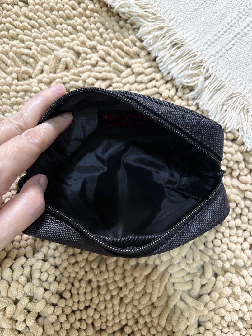 Imported TUMI pouch (Category: Belt bags, Clutches and Pouches) located in Quezon City. Submitted by heartshop.ph (Listing ID 1468963511, Image 2). Description: .