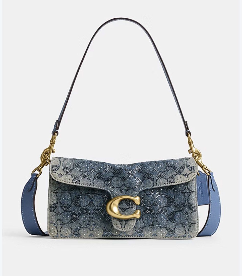 In Transit Coach Tabby Crystals Signature (Category: Shoulder Bags) located in Paranaque City. Submitted by mars_eshoppe (Listing ID 1468967505, Image 2). Description: .