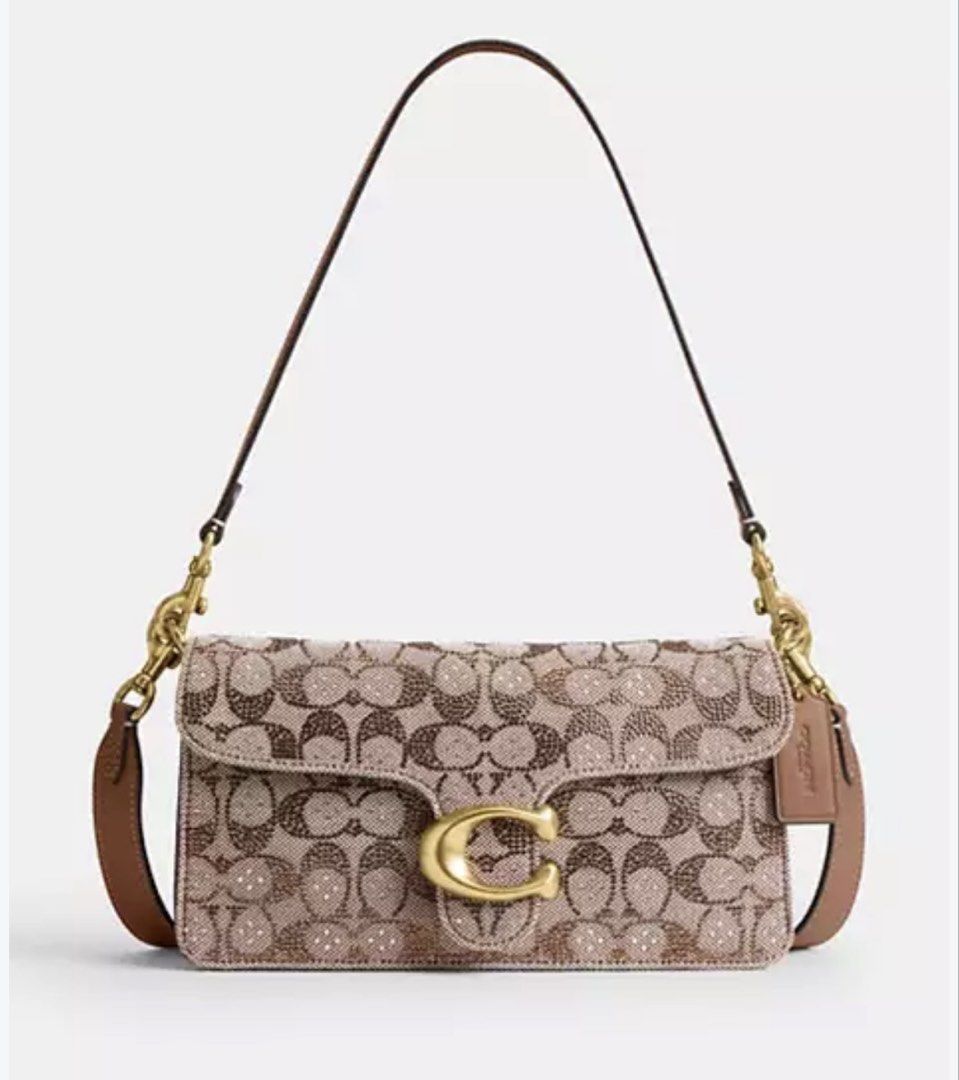 In Transit Coach Tabby Crystals Signature (Category: Shoulder Bags) located in Paranaque City. Submitted by mars_eshoppe (Listing ID 1468967505, Image 1). Description: .