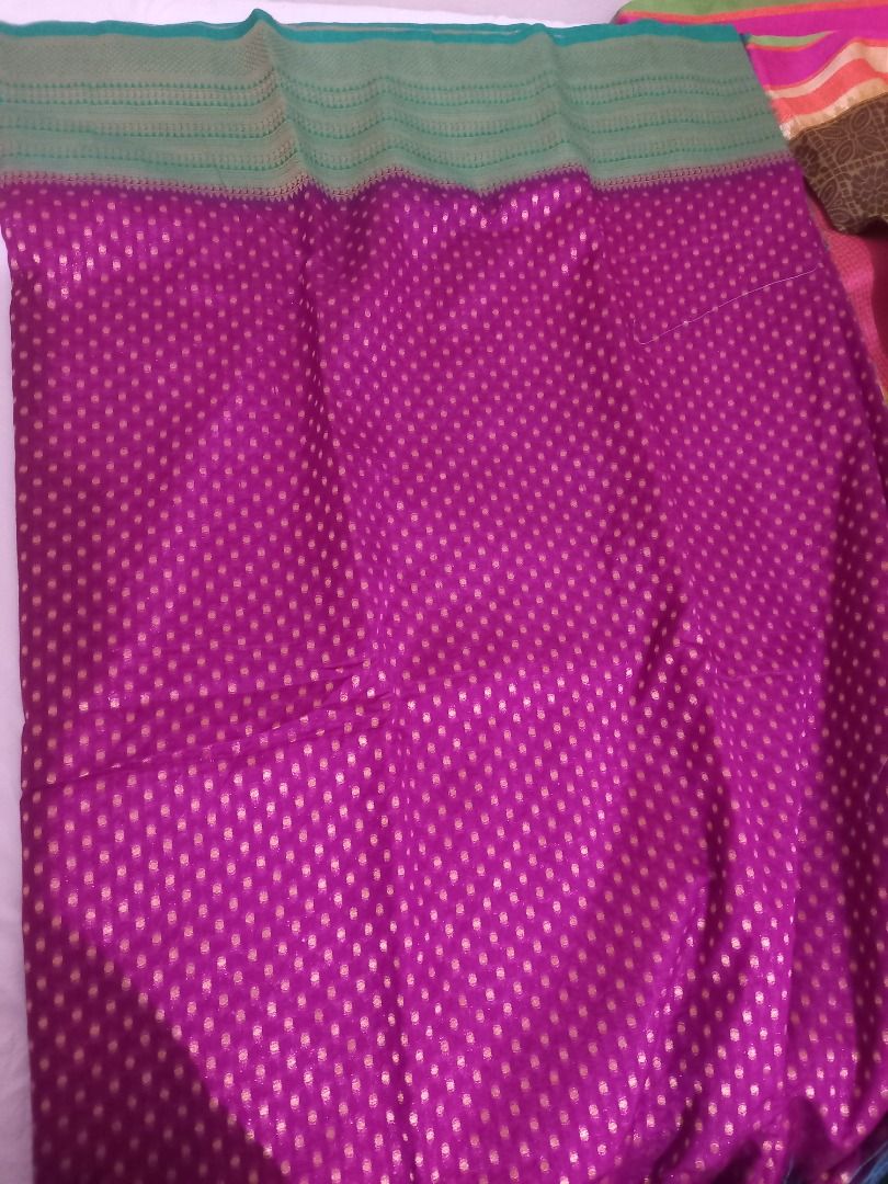 Indian saree with floral patterns and traditional prints (Category: Traditional & Ethnic wear) located in Quezon City. Submitted by janefdc (Listing ID 1469037093, Image 3). Description: Gorgeous traditional Indian sarees in vibrant colors like red, teal, green, and beige. Featuring intricate woven floral patterns and rich borders. Perfect for cultural events and traditional occasions. Multiple distinct colors and prints available. DM for inquiri