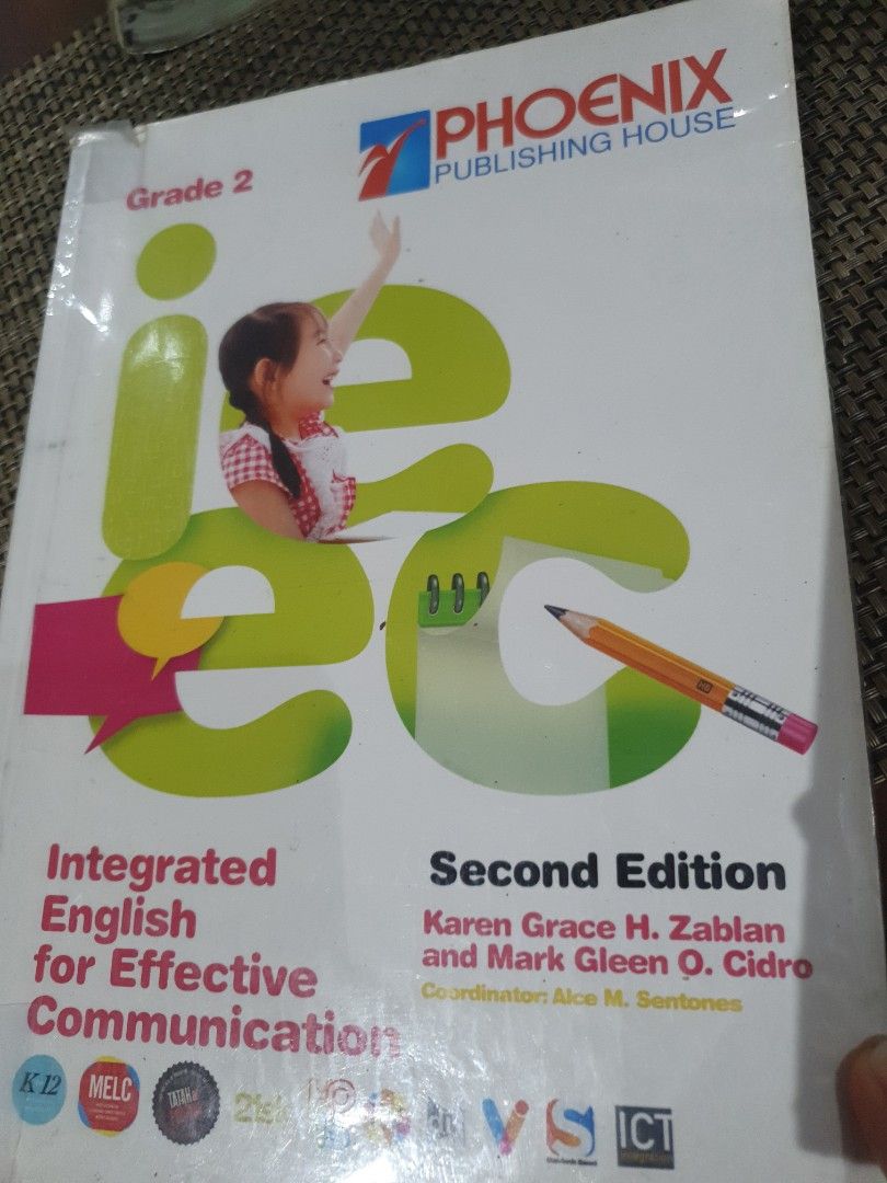 Integrated English for Effective Communication Grade 2 Second Edition (Category: Textbooks) located in Guagua. Submitted by lavieestviah (Listing ID 1468943640, Image 1). Description: - Title: Grade 2 English Textbook (2nd Edition) - Authors: Karen Grace H. Zablan and Mark Gleen O. Cidro - Publisher: Phoenix Publishing House (2022) - Focus: Communication skills, vocabulary, and grammar lessons - Ideal For: Elementary students and homeschooling pa