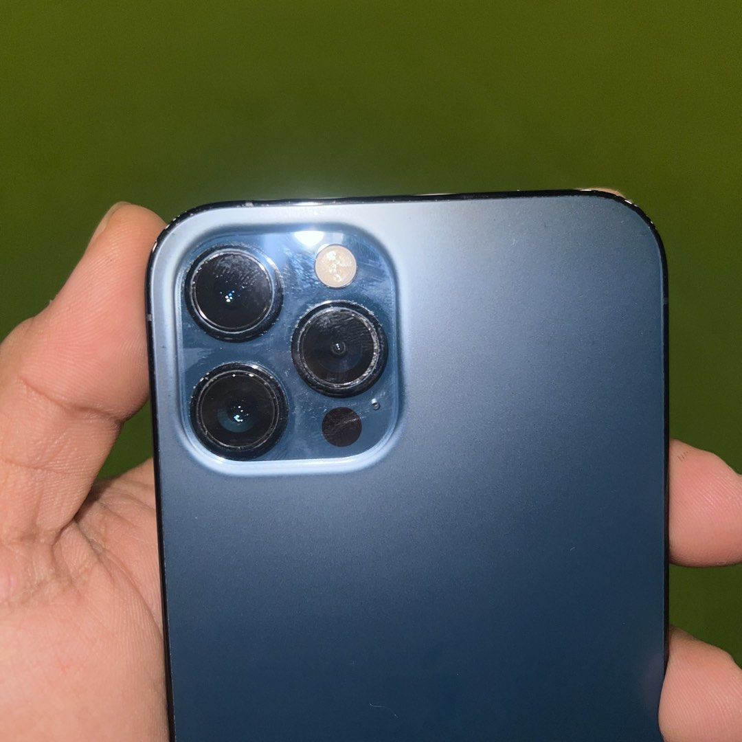 Iphone 12 Pro Max 256 GB (Category: iPhone 12 Series) located in Quezon City. Submitted by jnrvntr (Listing ID 1469128228, Image 3). Description: - Brand/Model: Apple iPhone 12 Pro Max - Storage Capacity: 256 GB - Color: Pacific Blue - Condition: Well-maintained, clean exterior, and fully functional Honest Issue: - Small dent sa camera (doesn’t affect performance) - 66% Batt Health Willing to meet up near QC, MAKATI, MARIKINA.