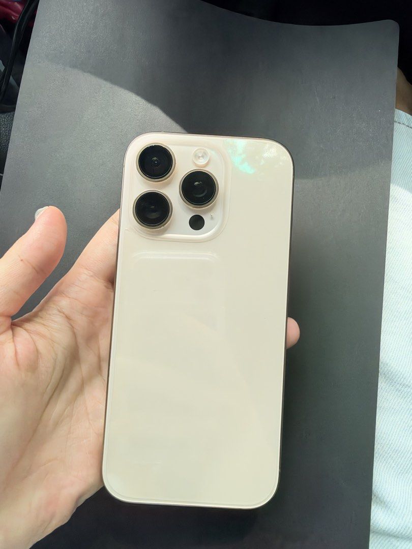 IPHONE 16 PRO 256GB (Category: iPhone 16 Series) located in Makati City. Submitted by chelsieaca (Listing ID 1468953151, Image 1). Description: FS: IPHONE 16 PRO ✨ Lady Owned 256GB Dessert Titanium All Original Parts (Guaranteed) Open Line No issue One and only scratch (1 side cam due to case) YES 1 LANG GASGAS. See photo, not that visible. NO DENTS ✔️91% Batt health ✔️Face ID ✔️True tone ✔️Password working ✔️All cams no issue Unit, Box, Tempered