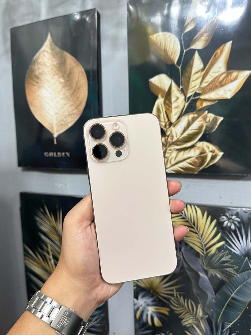 iPhone 16 Pro Max 256GB (Category: iPhone 16 Series) located in Manila. Submitted by _tinnn (Listing ID 1469120803, Image 2). Description: For Sale 44k or Swap iPhone 16 Pro Max ( Dessert Titanium ) 256GB, Any Sim. PH Variant & NTC Approved 92BH ( 695CC ), IOS 27.0.1 No Issue, Brandnew Condition With Original Box & UAG Magnetic Clear Case.