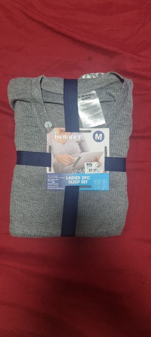 Isotoner Ladies 2PC Sleep Set Grey M (Category: Undergarments & Loungewear) located in Manila. Submitted by ags028705 (Listing ID 1469158778, Image 1). Description: - Brand: Isotoner - Type: Ladies 2-piece sleep set - Size: Medium - Color/Pattern: Grey waffle knit top with button detail + grey & white leopard print bottoms - Condition: Brand new, neatly folded in original cardboard packaging band.