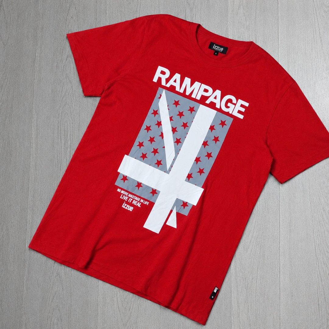 Izzue Rampage Red T-Shirt (Category: Tshirts & Polo Shirts ) located in Taguig. Submitted by althriftdailyloots94 (Listing ID 1465072360, Image 1). Description: - Brand/Style: Authentic Izzue bright red t-shirt with short sleeves and classic crew neck - Design: Large white and grey front graphic featuring 'RAMPAGE' text, motivational slogan, and red star accents - Fit & Fabric: Relaxed everyday fit made from soft, comfortable cotton - Details: In