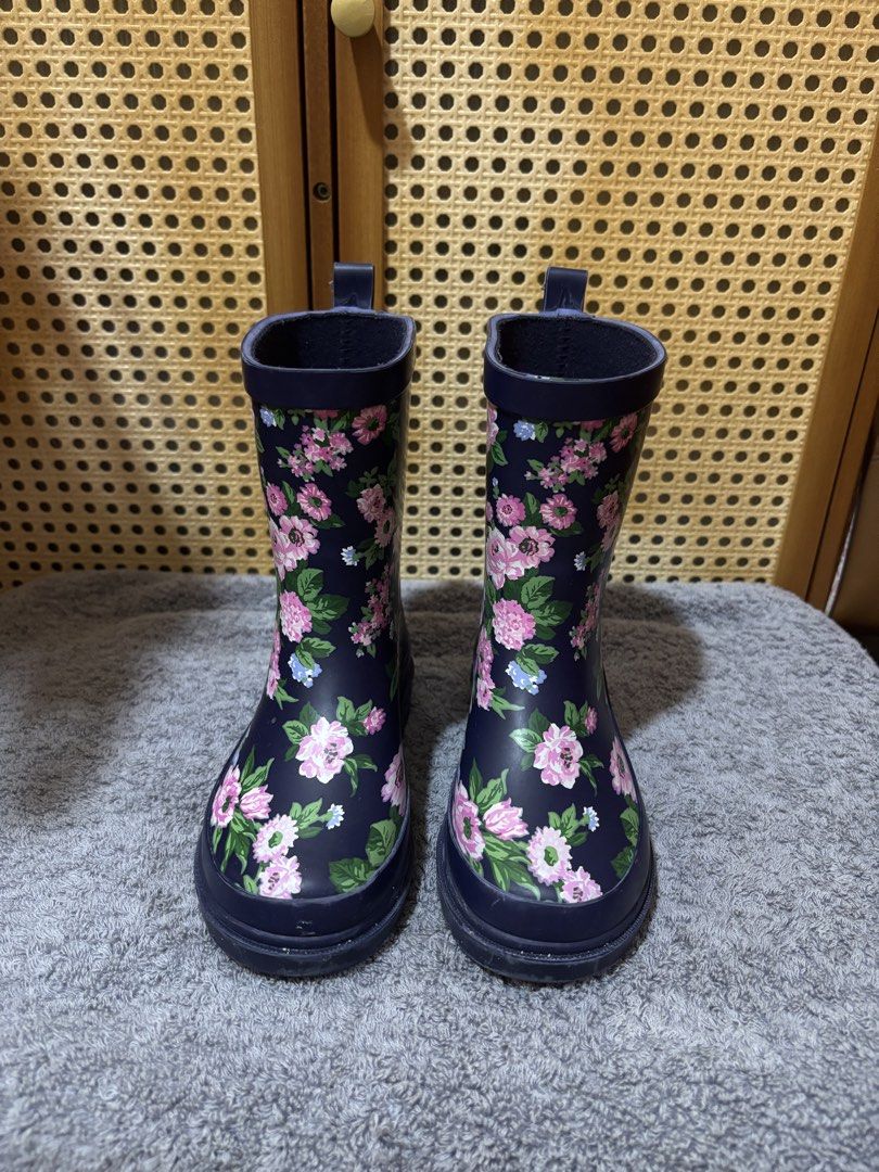 Janie and Jack Navy Blue Floral Pattern Rain Boots (Category: Babies & Kids Fashion) located in Manila. Submitted by wardrobeinmnl (Listing ID 1469048526, Image 2). Description: SIZE: 9 - Color/Design: Navy blue with pink floral and green leaf print - Height: Mid-calf with dark top trim - Features: Pull tabs at the back for easy wear - Sole: Dark soles with light traction - Interior: Comfortable dark fabric lining - Condition: Good footwear for r