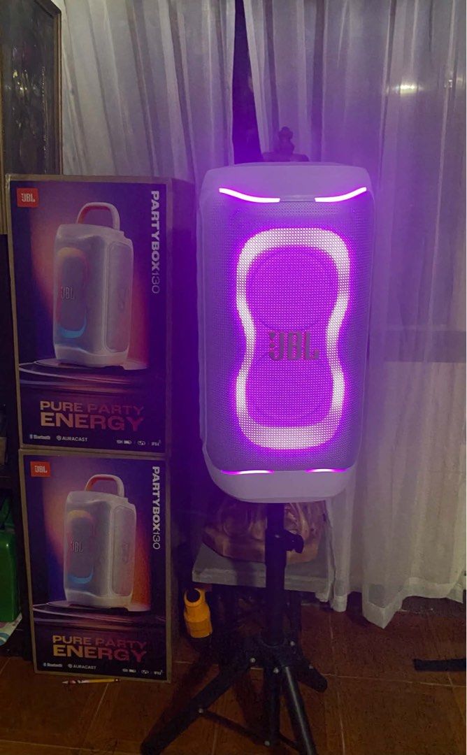 JBL PartyBox 130 Portable Speaker with Lights (Category: Soundbars, Speakers & Amplifiers) located in Manila. Submitted by overlytrim67 (Listing ID 1469034977, Image 3). Description: - Model: JBL PartyBox 130 Wireless Party Speaker (Sleek White) - Lighting: Customizable LED lights with vibrant blue and purple glow - Connectivity: Bluetooth and Auracast supported - Durability: IPX4 splashproof design for worry-free outdoor use - Battery: Up to 15 