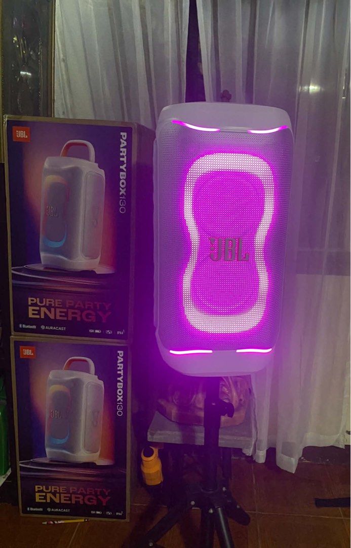 JBL PartyBox 130 Portable Speaker with Lights (Category: Soundbars, Speakers & Amplifiers) located in Manila. Submitted by overlytrim67 (Listing ID 1469034977, Image 2). Description: - Model: JBL PartyBox 130 Wireless Party Speaker (Sleek White) - Lighting: Customizable LED lights with vibrant blue and purple glow - Connectivity: Bluetooth and Auracast supported - Durability: IPX4 splashproof design for worry-free outdoor use - Battery: Up to 15 