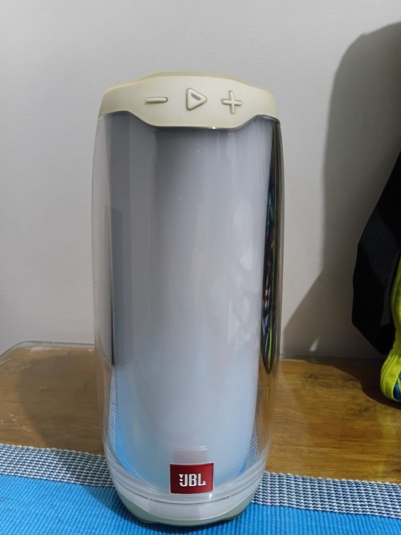 JBL Pulse 4 Wireless Bluetooth Speaker (Category: Soundbars, Speakers & Amplifiers) located in Cainta. Submitted by martin.a1021 (Listing ID 1469101843, Image 2). Description: - Authentic JBL Pulse 4 wireless Bluetooth speaker in a stylish white and cream colorway - Stunning 360-degree LED light show for immersive room ambiance - Used with noticable yellowing .