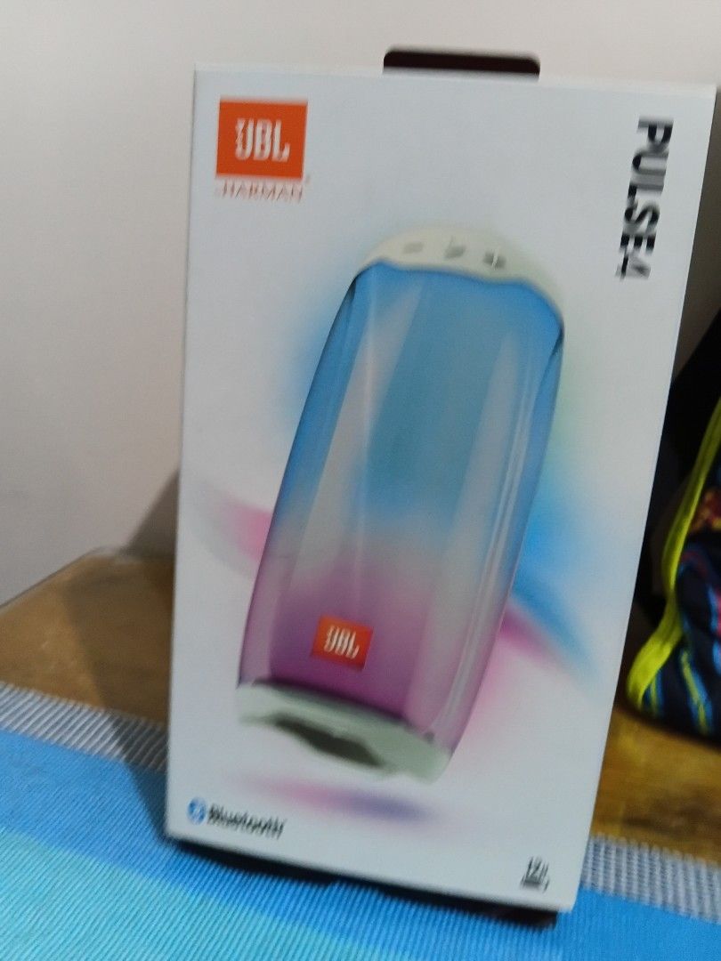 JBL Pulse 4 Wireless Bluetooth Speaker (Category: Soundbars, Speakers & Amplifiers) located in Cainta. Submitted by martin.a1021 (Listing ID 1469101843, Image 1). Description: - Authentic JBL Pulse 4 wireless Bluetooth speaker in a stylish white and cream colorway - Stunning 360-degree LED light show for immersive room ambiance - Used with noticable yellowing .