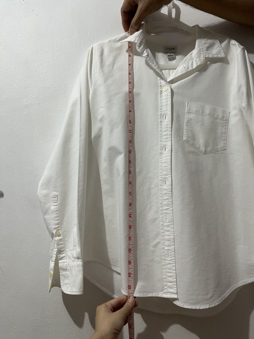 j.crew White Long Sleeve Button-Down Shirt (Category: Longsleeves) located in Cavite. Submitted by jeklitam07235 (Listing ID 1468311964, Image 2). Description: - Brand: J.Crew - Size: Small - Color: Classic White - Material: 100% Cotton - Features: Classic collar, front button closure, left chest pocket, long sleeves with button cuffs - Condition: Excellent - Style: Versatile everyday staple, easy to dress up for the office or down for casual day