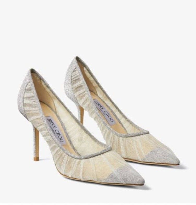 Jimmy Choo Shoes (Category: Heels) located in Batangas. Submitted by thriftshop_izy15 (Listing ID 1469009208, Image 1). Description: - Brand: Jimmy Choo - Style: Pointed toe stiletto pumps with ruched fabric - Material: Eye-catching silver glitter mesh - Condition: Soles show some signs of past use, but heels are structurally intact and sturdy - Inclusions: Classic branded insoles - Perfect for weddings, parties, and night outs! - Size: 36/23cm.